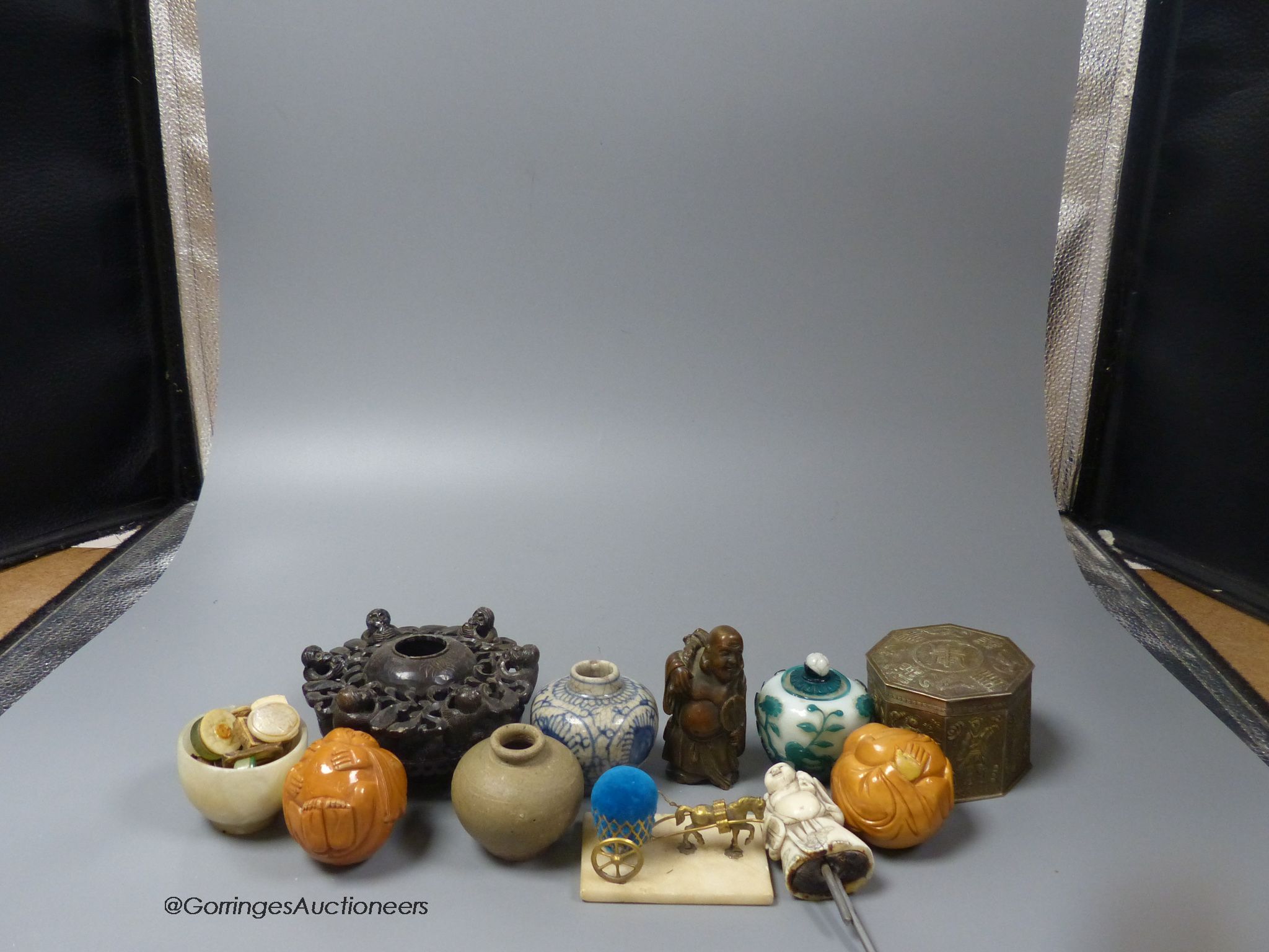 A collection of Chinese decorative pieces including glass, ceramic, metal and mineral